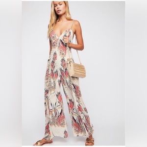 Free People size 4 Jumpsuit. Worn for a photo shoot only.